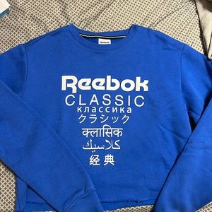 Never Worn REEBOK cropped blue pullover